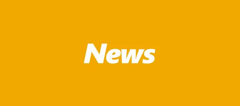 news written on yellow background